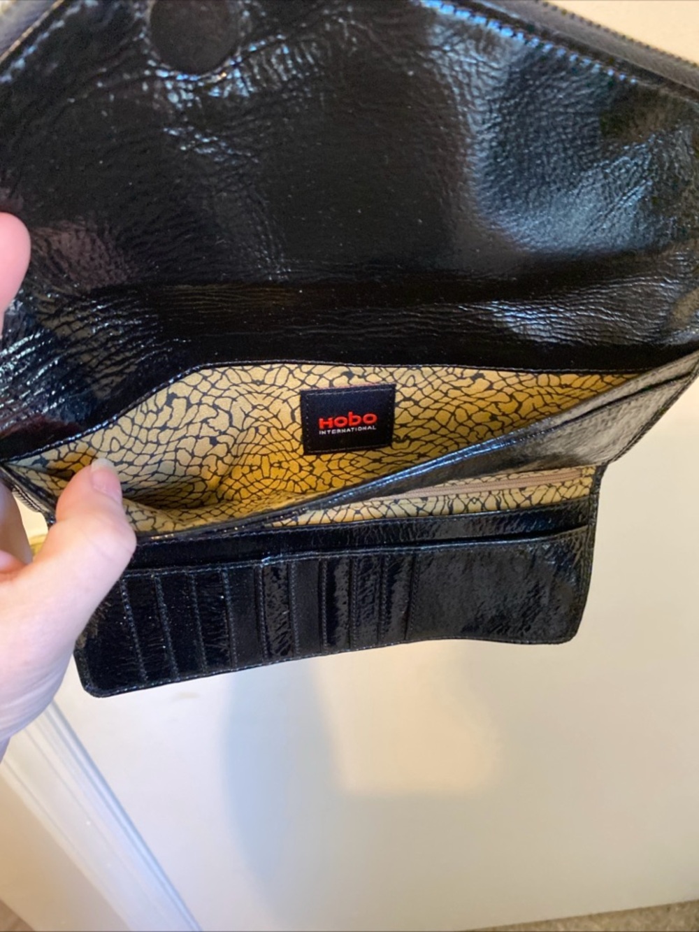 HOBO Black Patent Fold-Over Clutch with Diagonal Zip Magnetic Closure - Picture 11 of 15